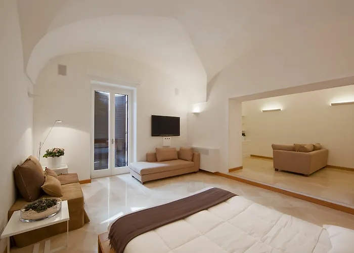 בית הארחה Santacroce Luxury לצ'ה